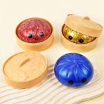 Jucarie Squishy Dumpling Lichid 12 Buc/Set cu Sclipici 9cm, Engros